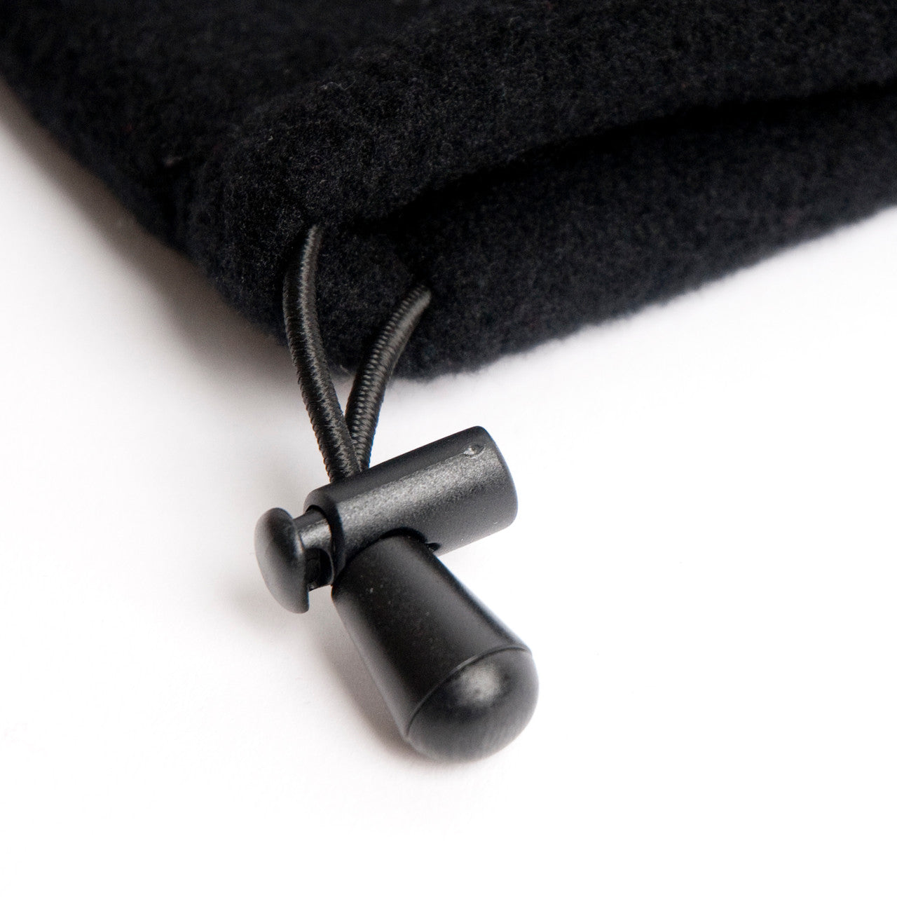 Toggle for adjustable Head Muff opening