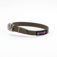 Thumbnail for Khaki biothane dog collar with a silver metal buckle and a black Smoochy Poochy label.