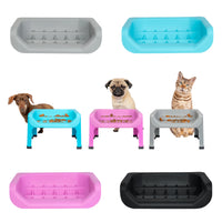 Thumbnail for Fluff Trough set featuring small feeding bowls in gray, blue, pink, and black with pets beside them.