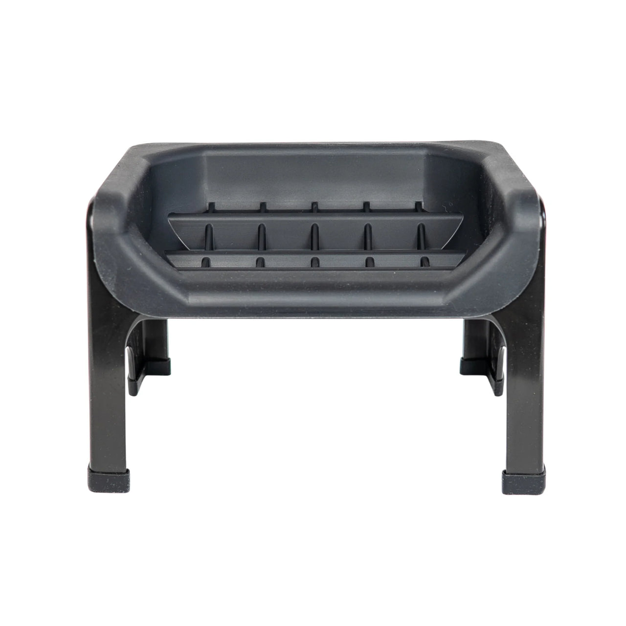 Fluff Trough set in black, featuring a small, sturdy design with a ribbed interior and four legs for stability.