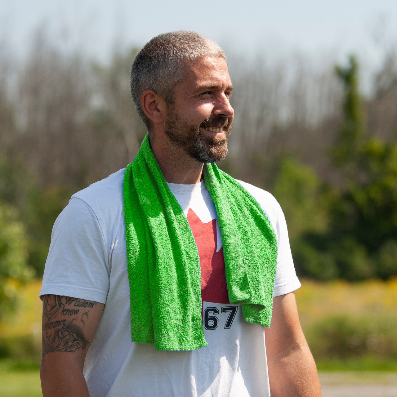 Man cooling off wearing a Chilly Dogs Sport Towel