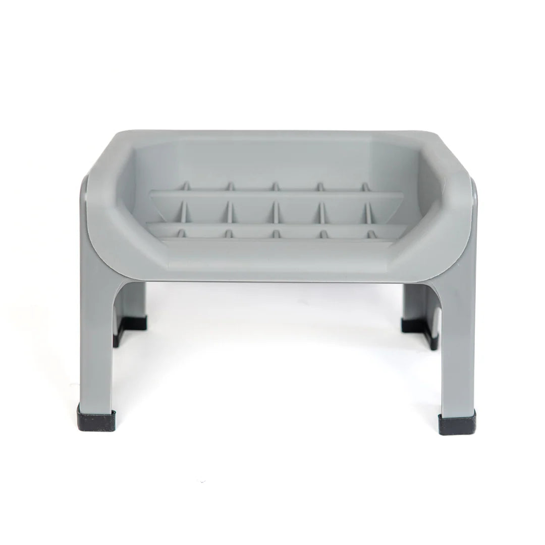 Fluff Trough set in gray, featuring a rectangular design with a textured surface and four sturdy legs.