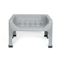 Thumbnail for Fluff Trough set in grey, featuring a small, elevated design with a textured surface and sturdy legs.