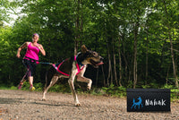 Thumbnail for Woman jogging with her dog in a  Nahak Pulling Harness