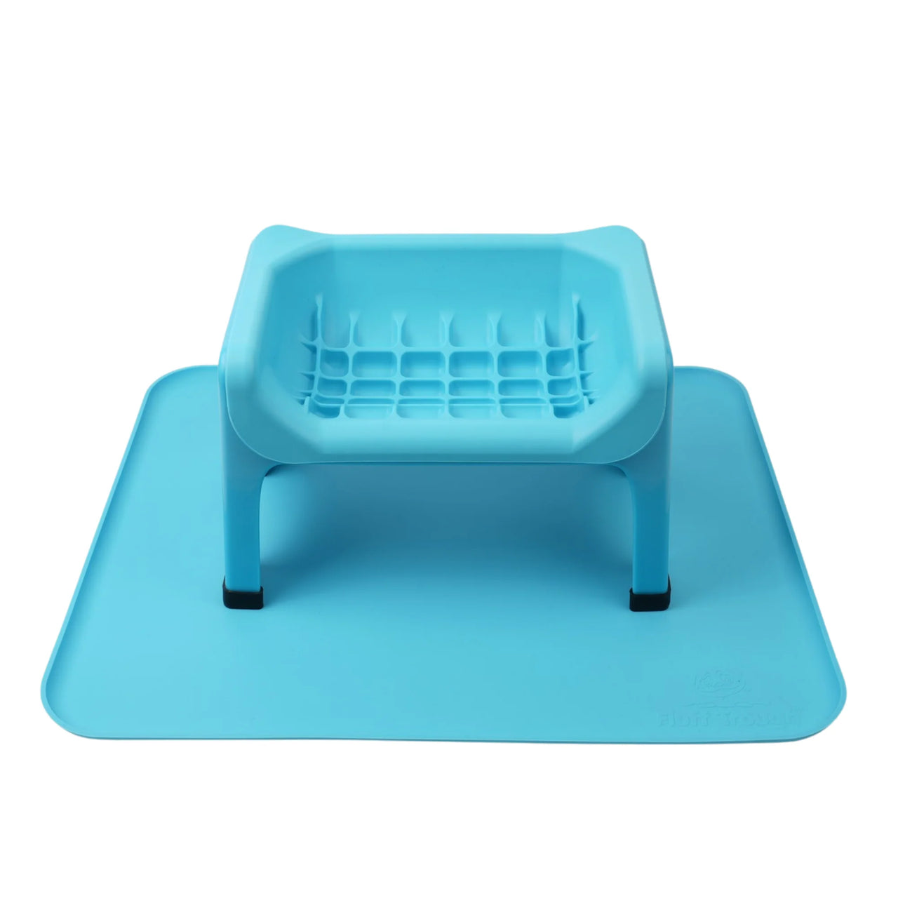 Fluff Trough silicone mat in light blue with a raised feeding trough and textured surface for stability.