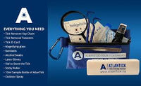 Thumbnail for PureGard tick kit with tools including tweezers, ID card, band-aids, and outdoor spray in a blue pouch.