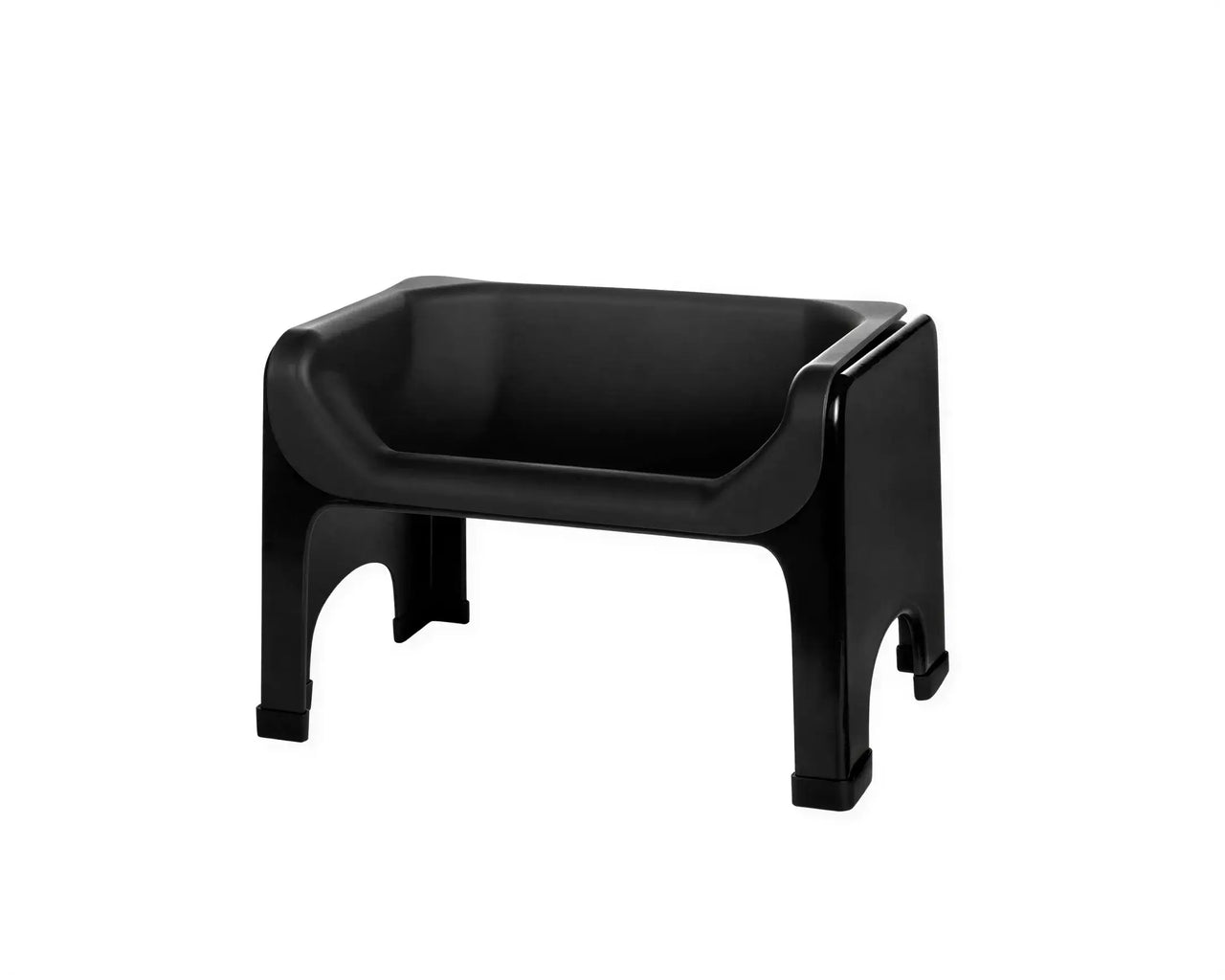Fluff Trough raised feeder in black, featuring a sturdy design and elevated bowl for easy access by pets.