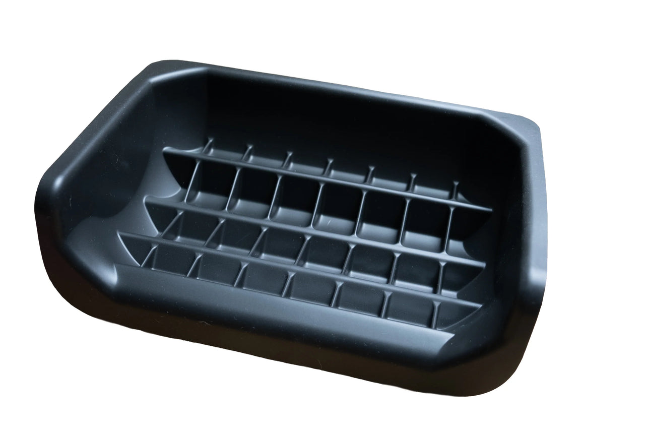 Fluff Trough XL binge blocker silicone insert in black with a textured surface and grid pattern for food separation.
